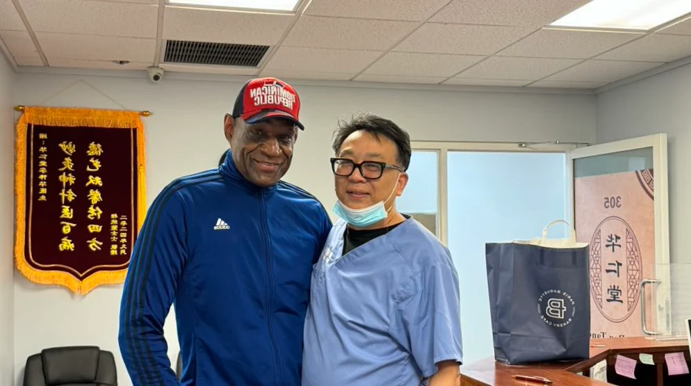 Dr. Jason Yi consulting with Bell's Palsy patient at Hua Ren Tang Acupuncture Clinic Flushing NY