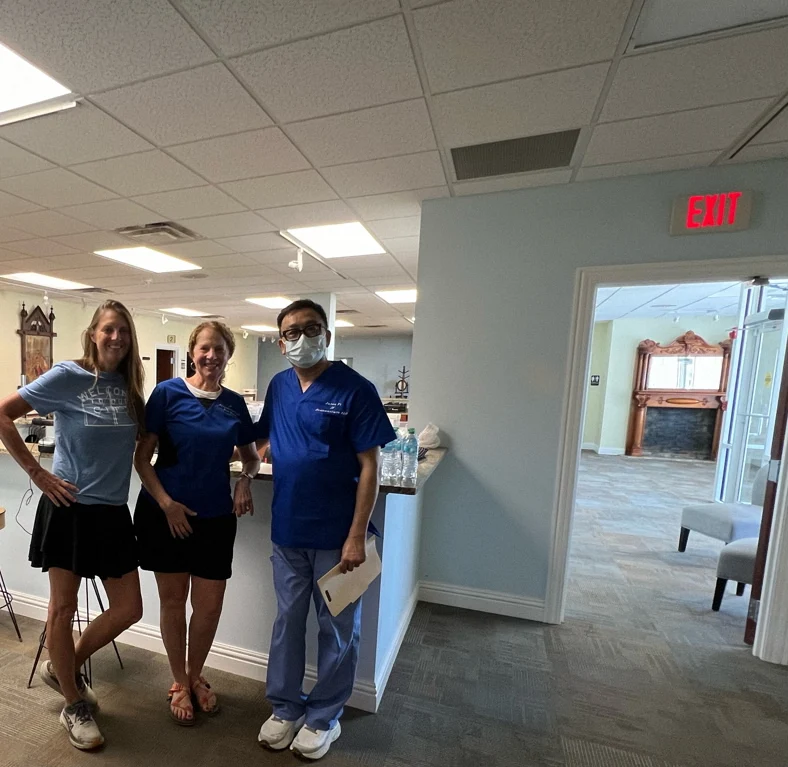 Dr. Jason Yi treating patient with acupuncture at Flushing clinic