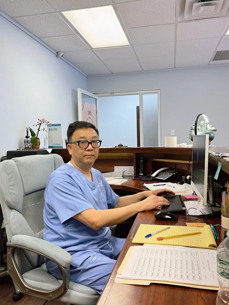 Dr. Jason Yi NCCAOM certified acupuncturist at Hua Ren Tang Flushing NY